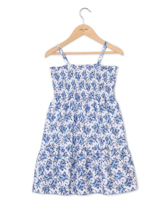 Robe smockée à bretelles imprimé fleur bleue