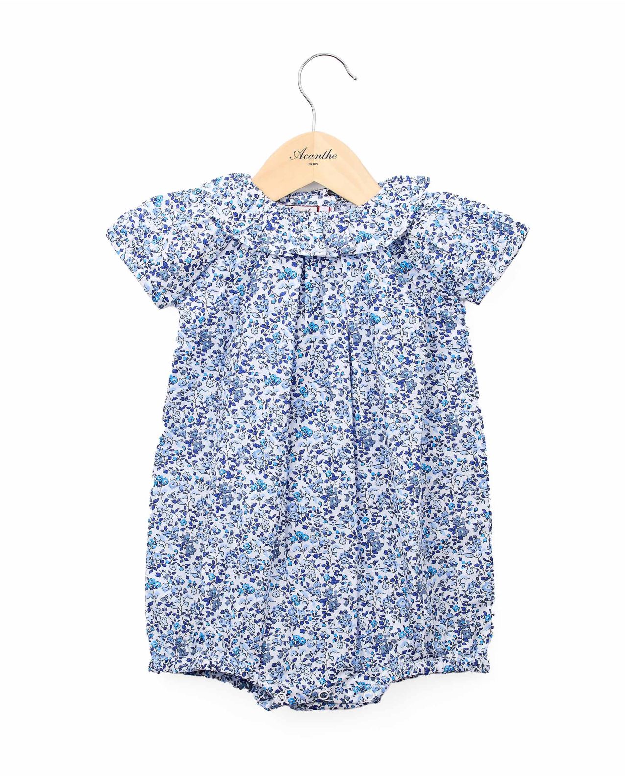 Barboteuse col volanté imprimé fleur bleue